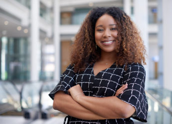 Cropped portrait of an attractive young businessman standing with her arms crossed in the office